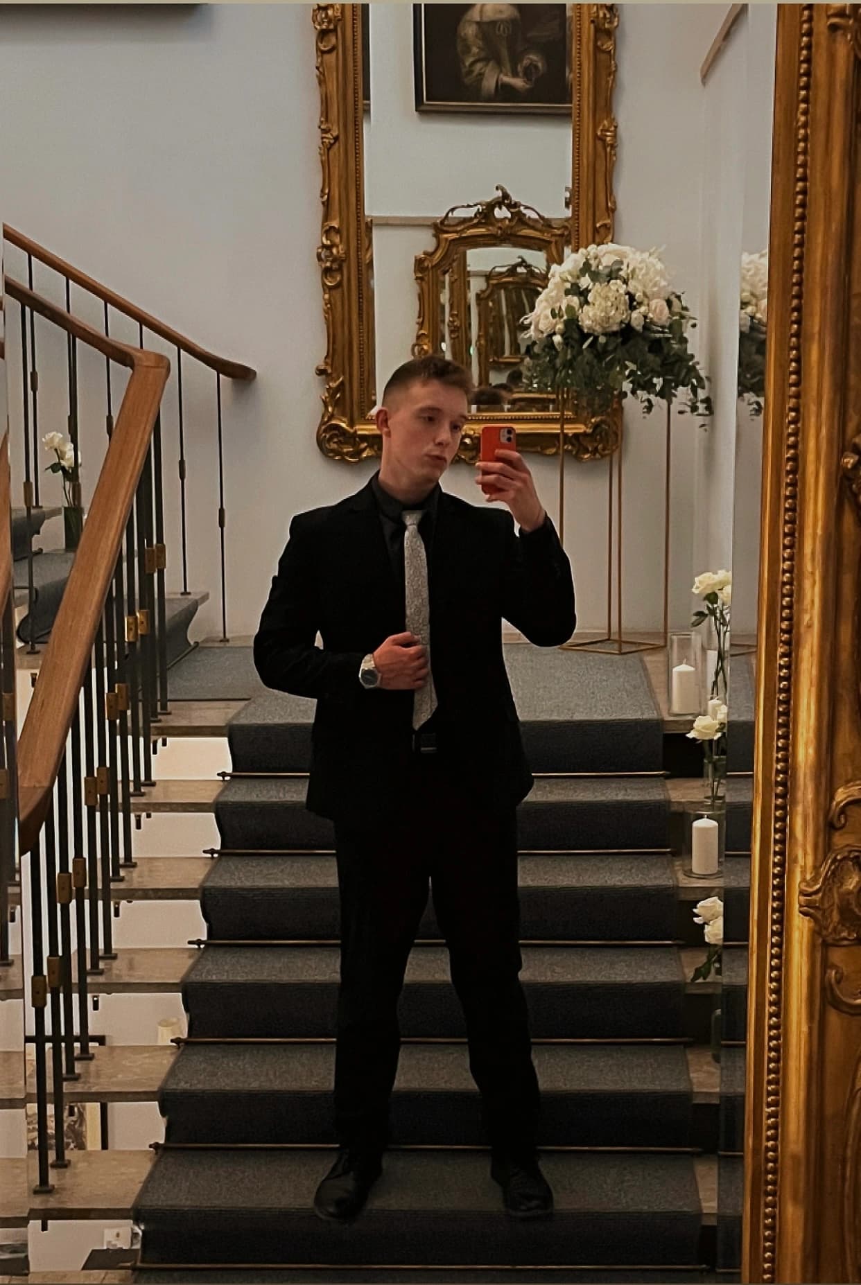 Vojtěch Bobek taking a mirror photo after a gym session.